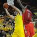 Michigan freshman Mitch McGary attempts a bucket around Ohio State junior Deshaun Thomas during Michigan's overtime win 76-74 win against Ohio State at Crisler Center on Tuesday, Feb. 5. Melanie Maxwell I AnnArbor.com
